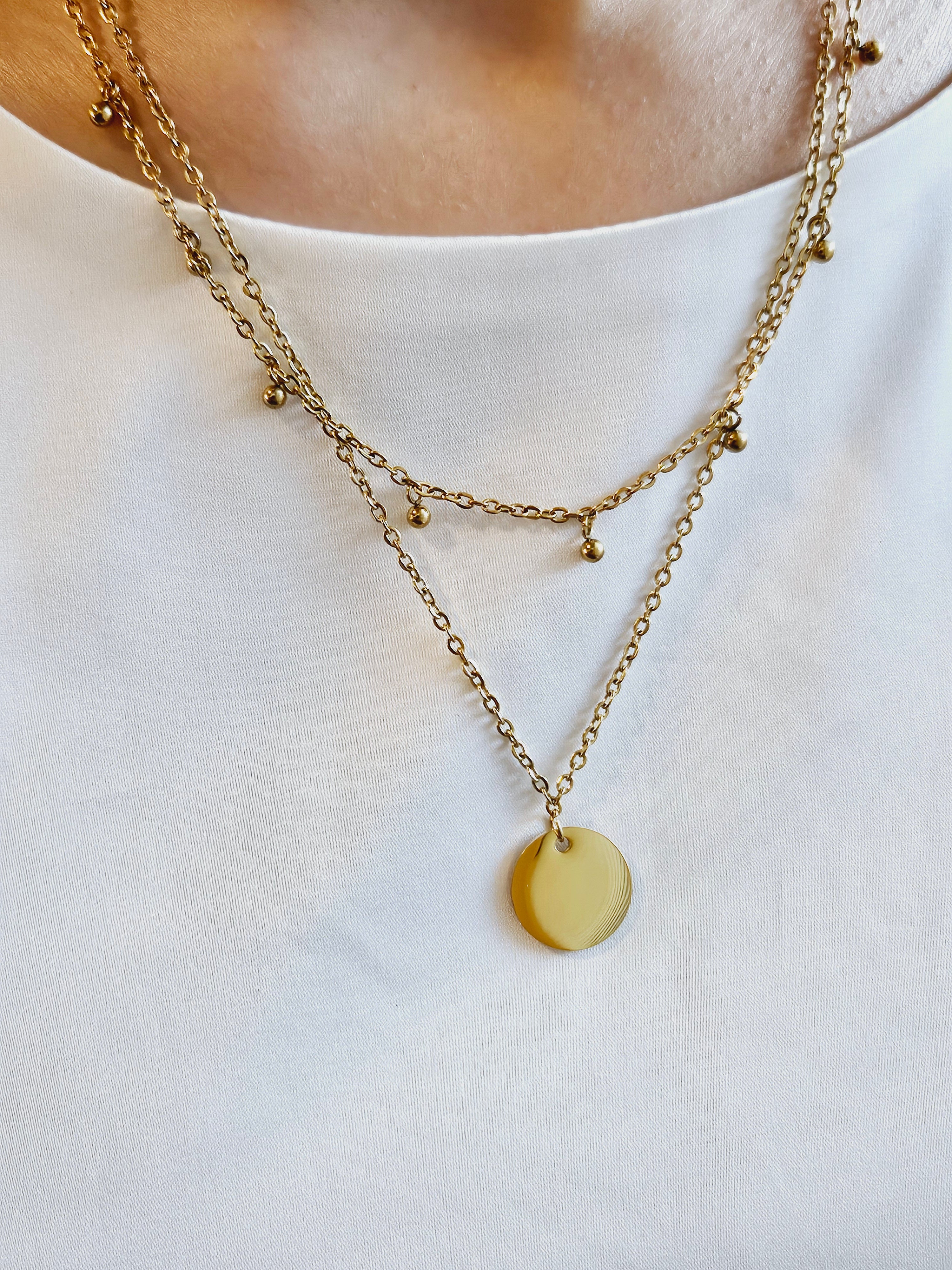 Double Layer with Medallion Pendent