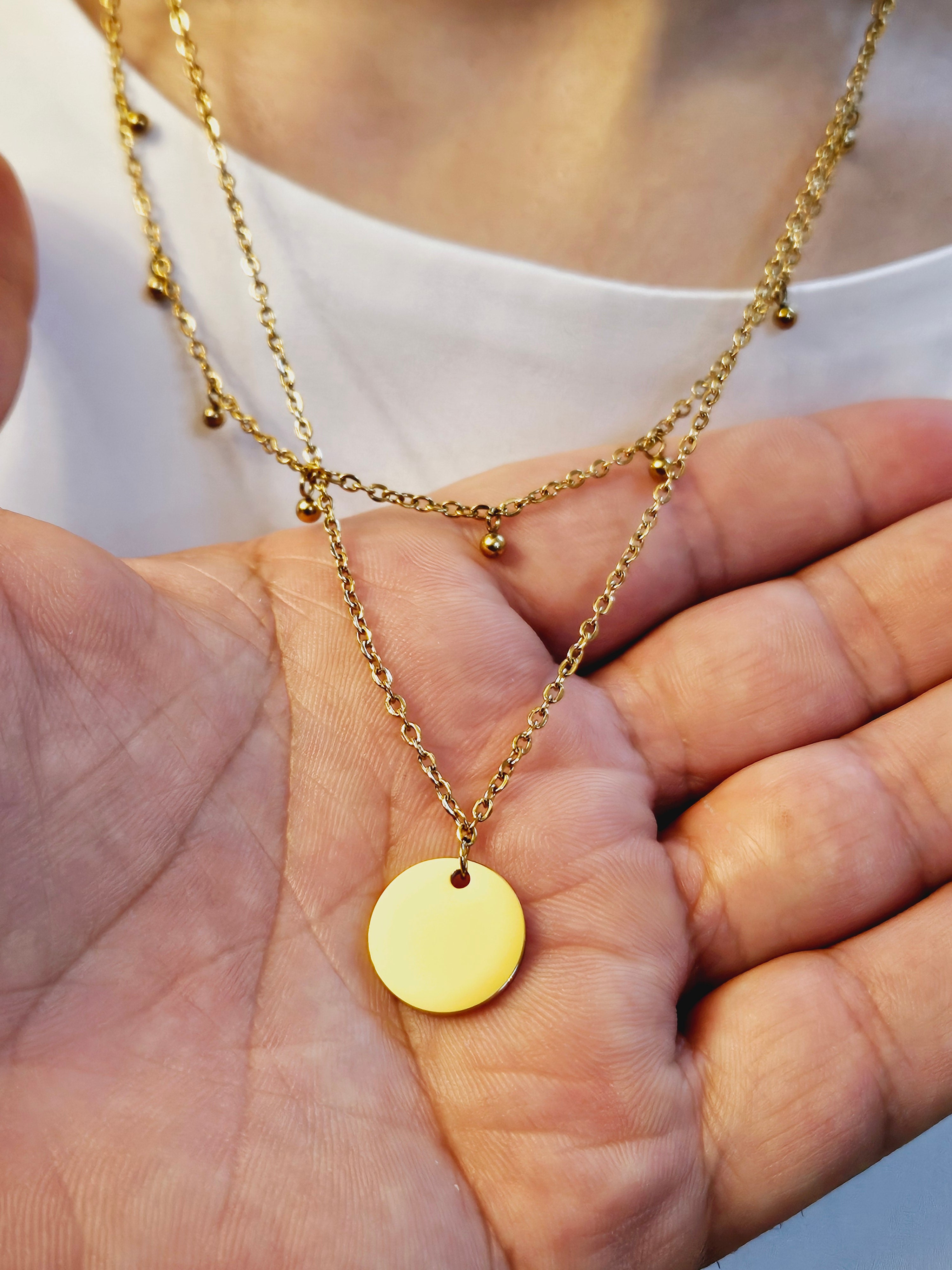 Double Layer with Medallion Pendent