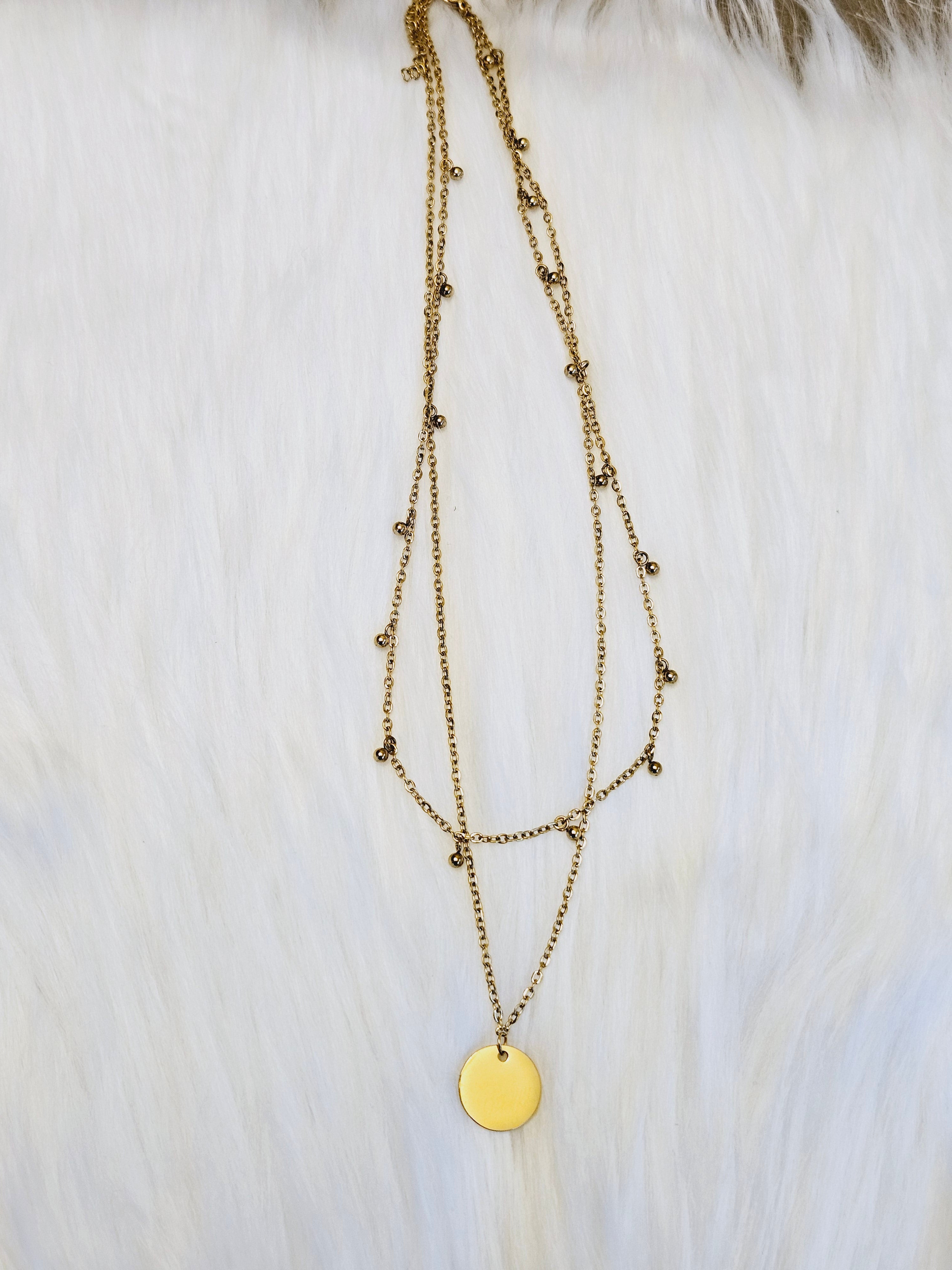 Double Layer with Medallion Pendent