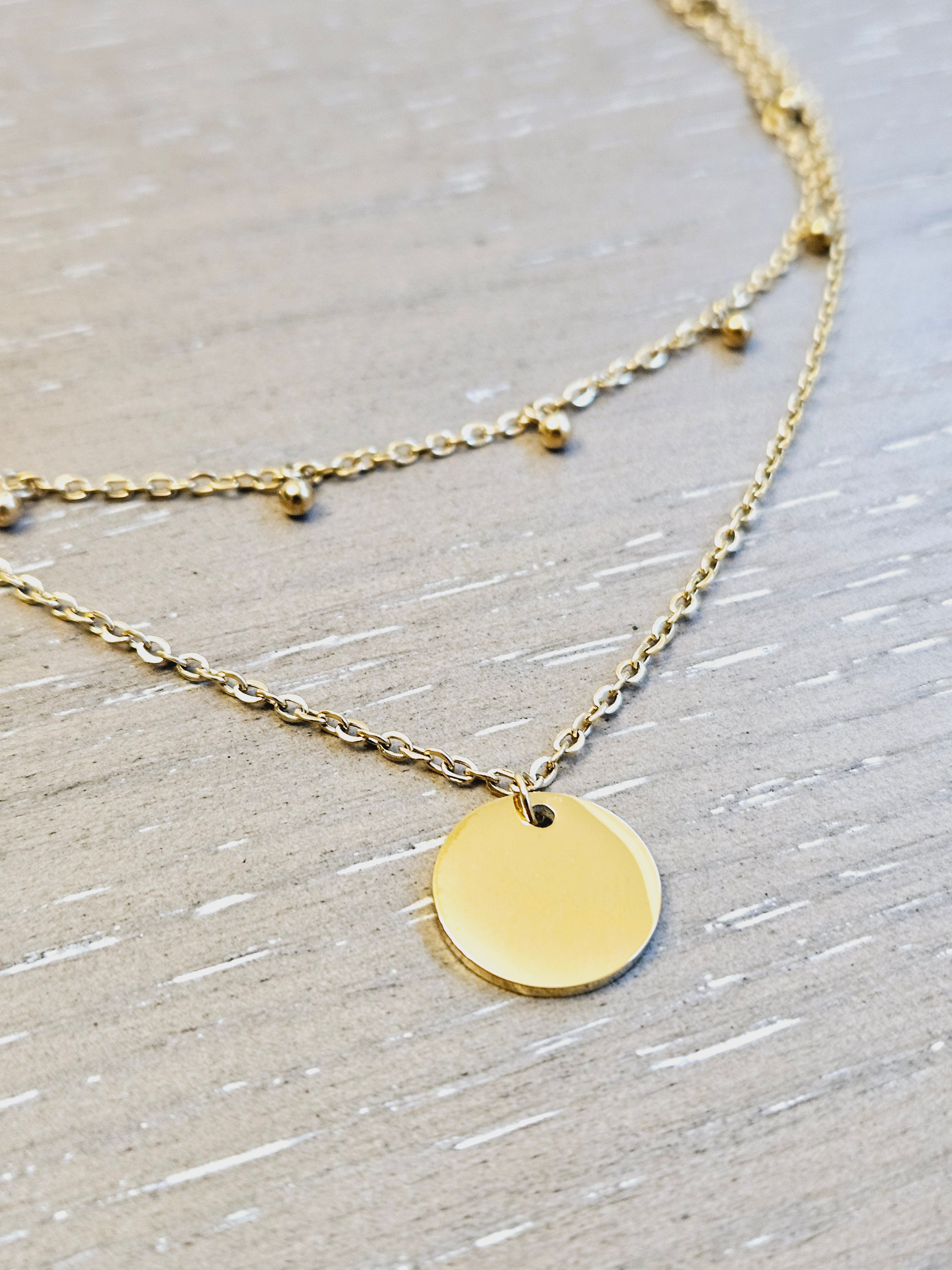 Double Layer with Medallion Pendent